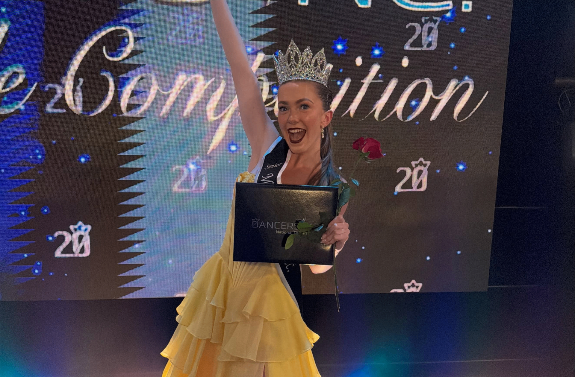 Senior National Title winner, crowned and glowing.